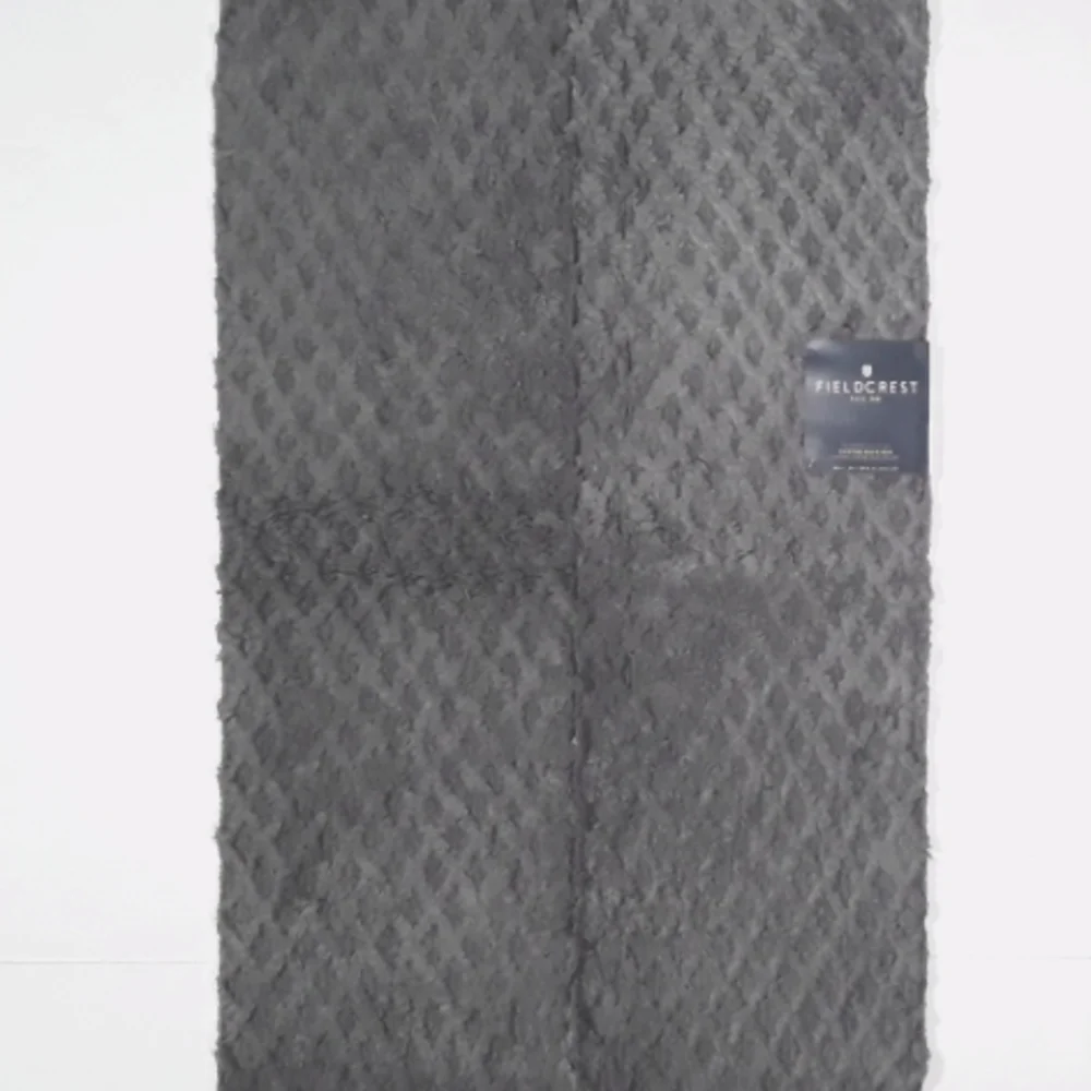 Fieldcrest reserved collection cotton bath rugs.